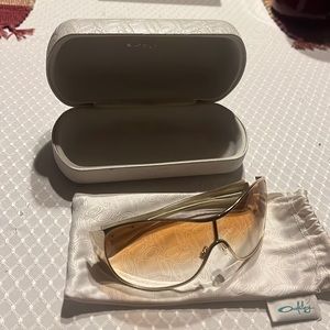 Oakley Vintage gold framed with sequins and inlaid wood grain. No scratches.